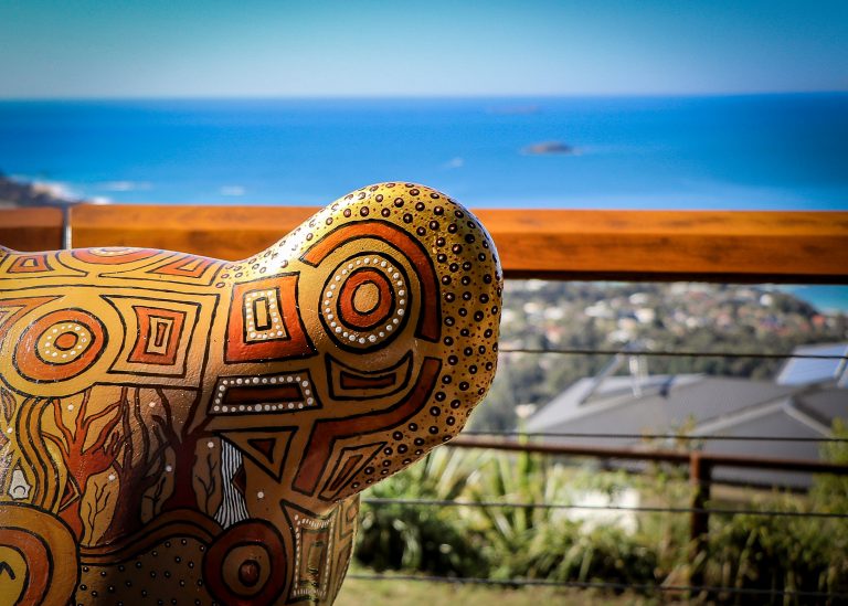 Guula the Koala sculpture takes in the view from Korora Lookout