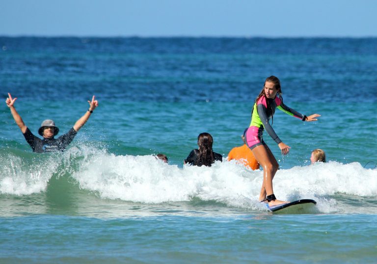 Coaches get as stoked as the participants with riding waves on the Coffs Coast