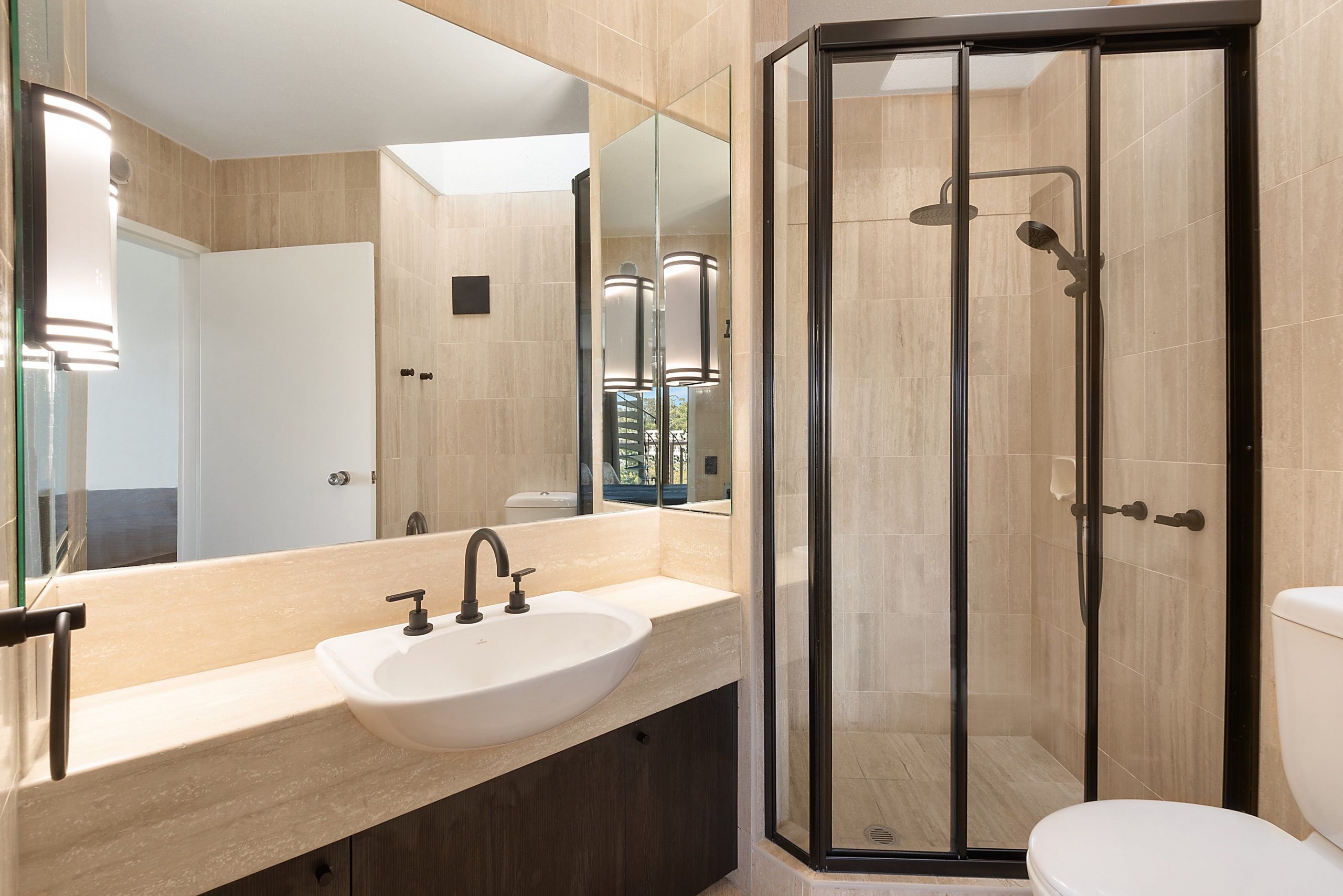 Ensuite with stone finishes