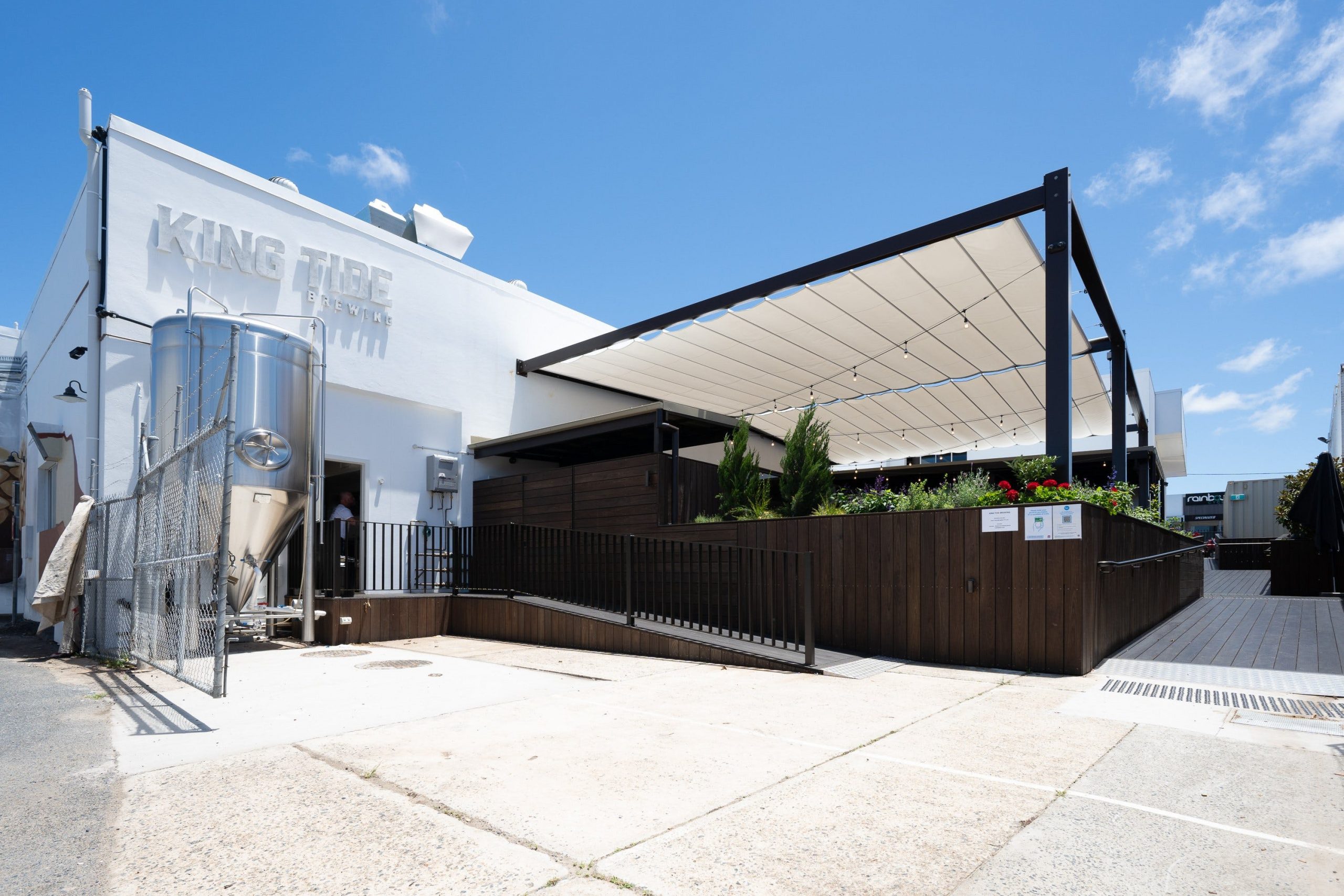 entrance picture of the building with logo on the wall
