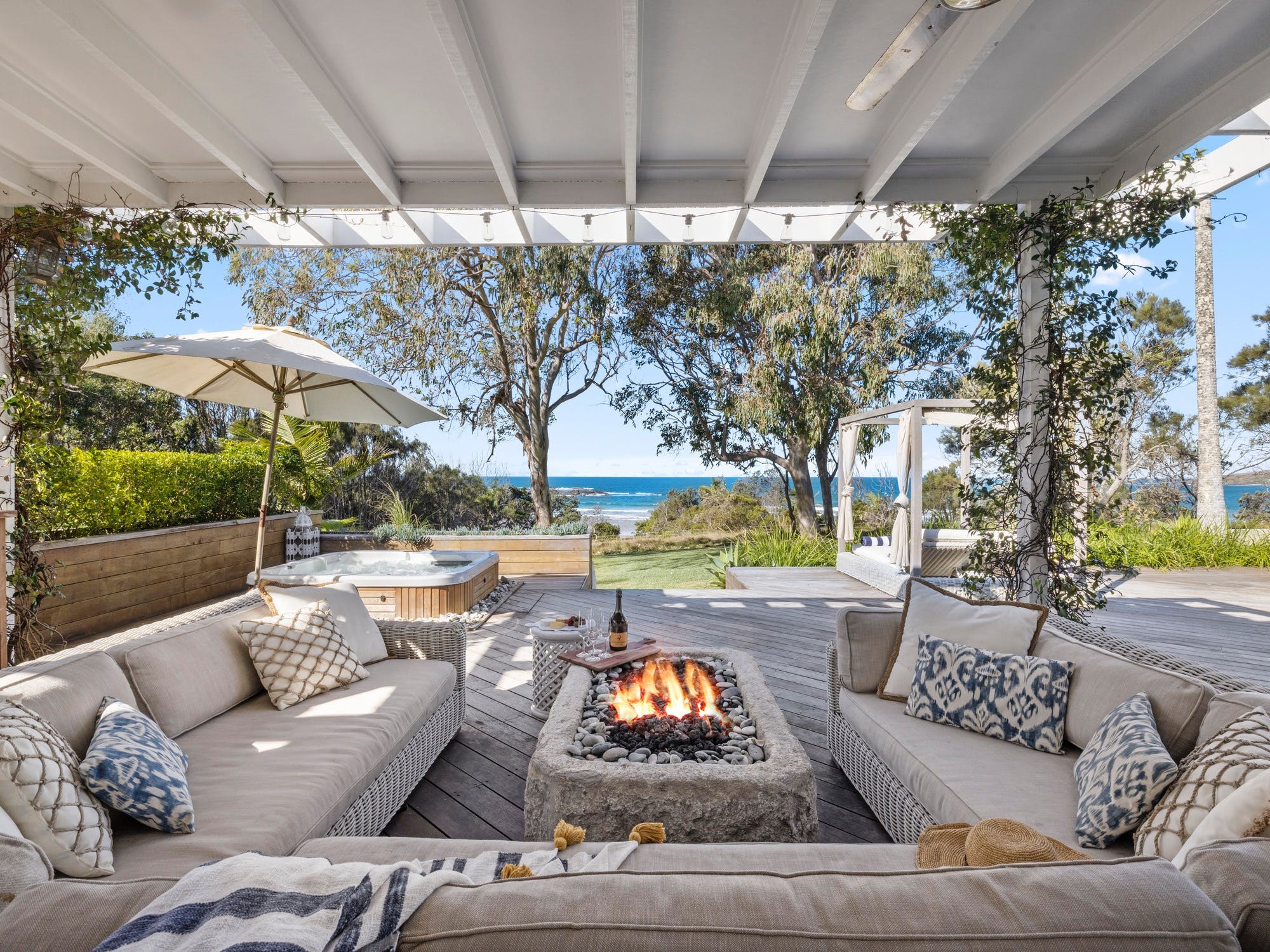 Outdoor seating with fire pit and lounge chairs