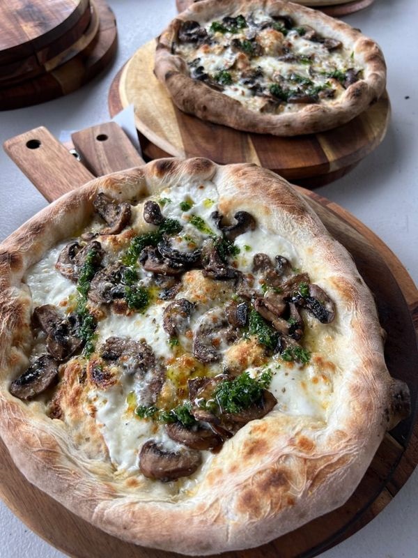 Hand stretched, woodfired pizza at Stef Beachstone