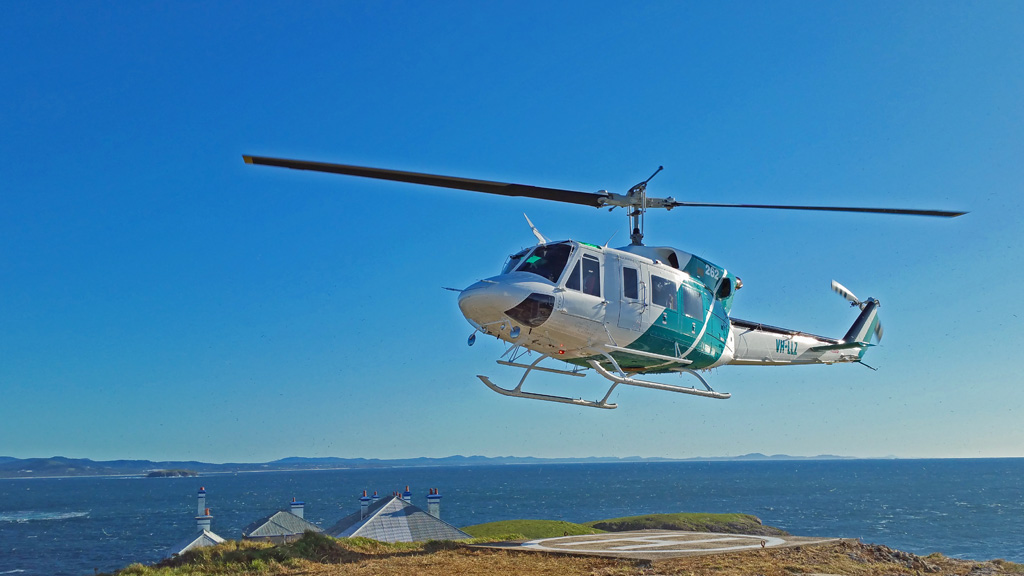 Precision Helicopters Coming In To Land