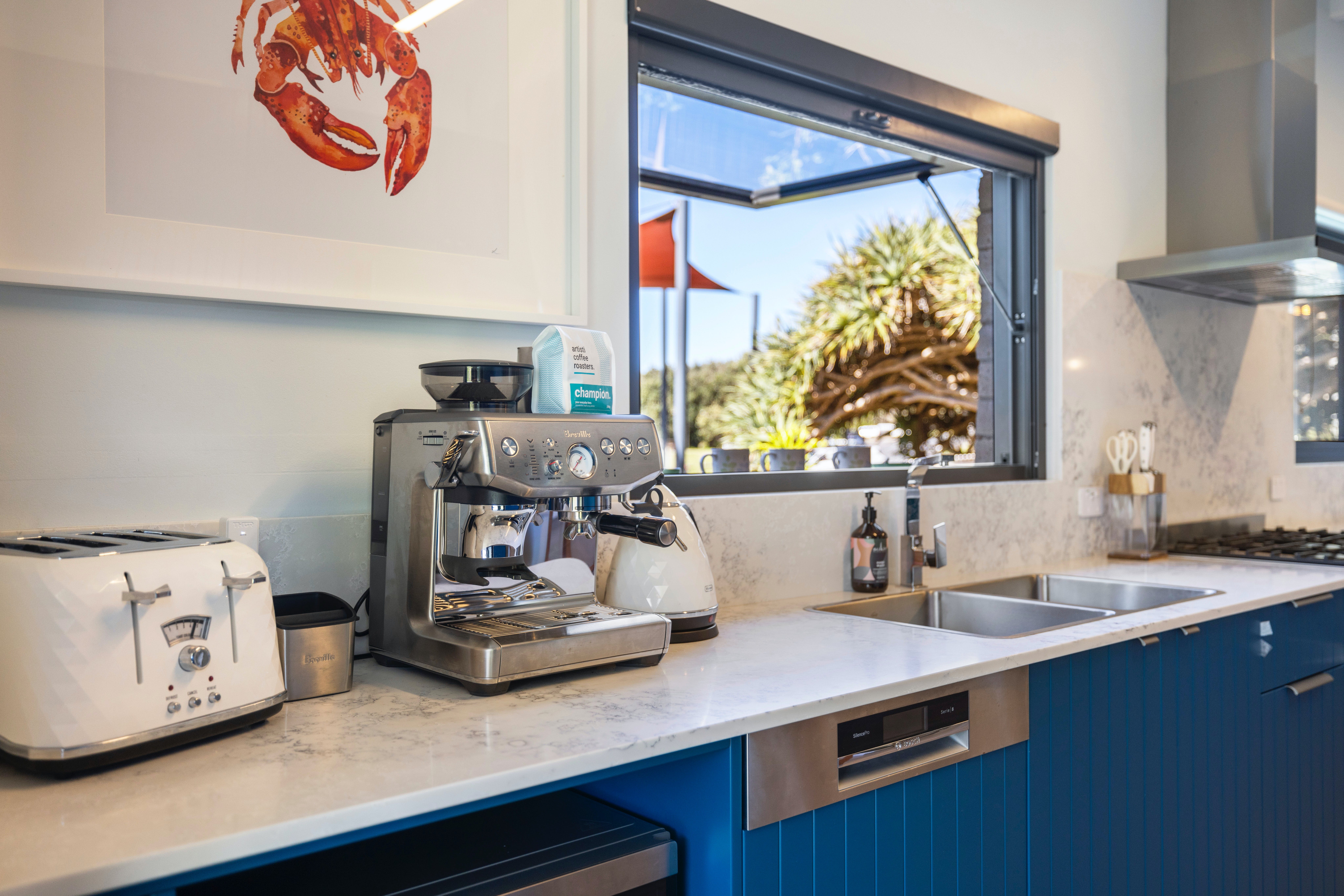 Kitchen with coffee machine