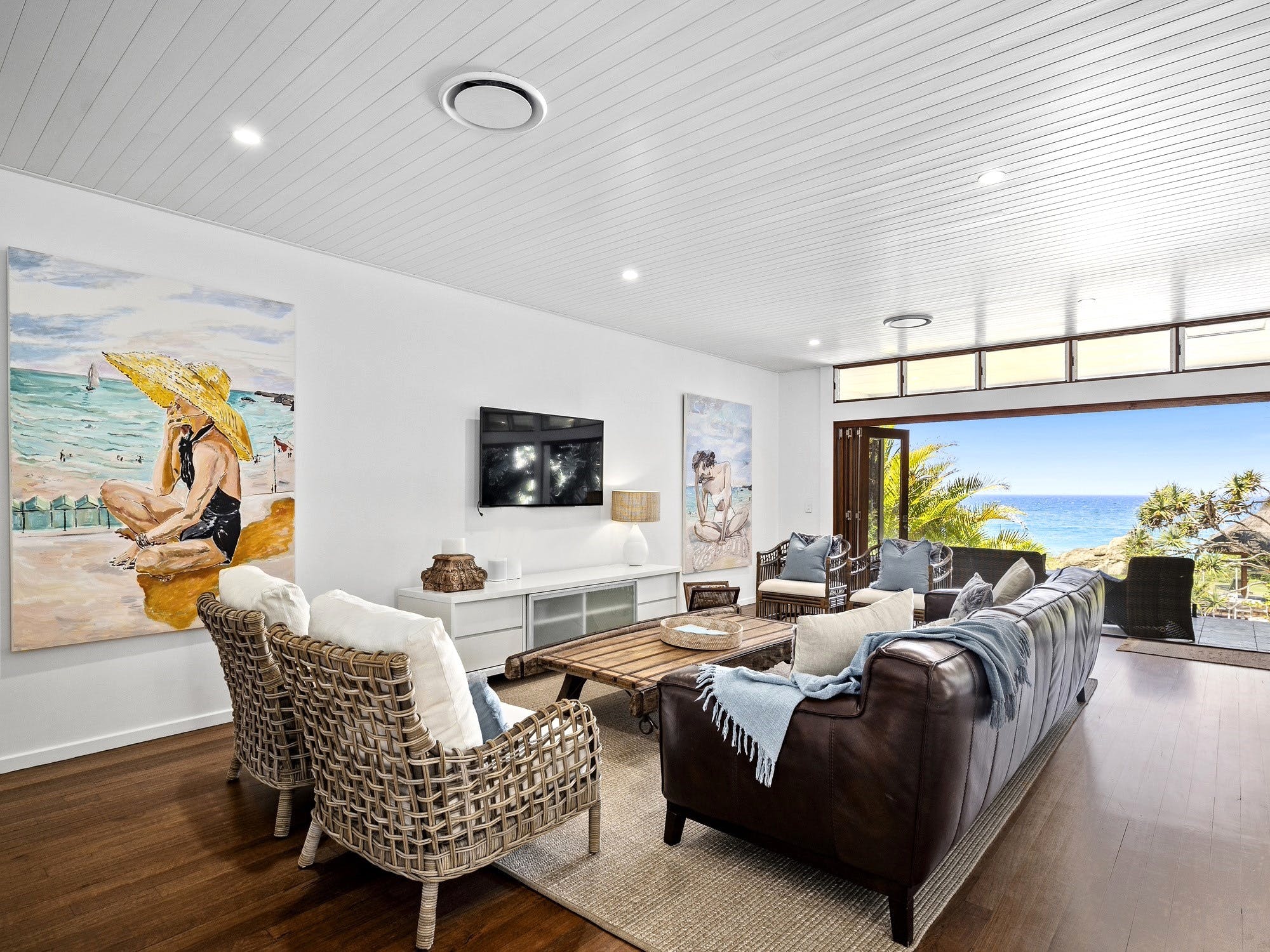 Lounge room with rainforest and ocean views