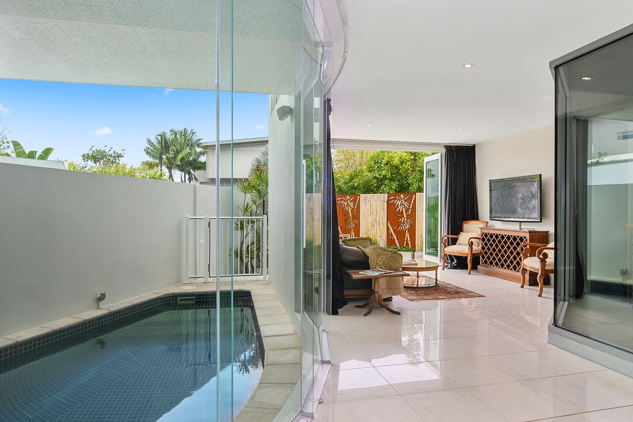 Heated pool and downstairs lounge room