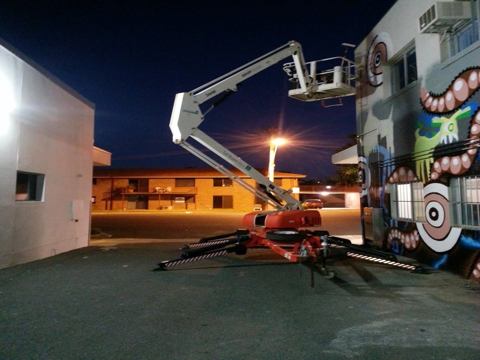 Crane used to paint high wall