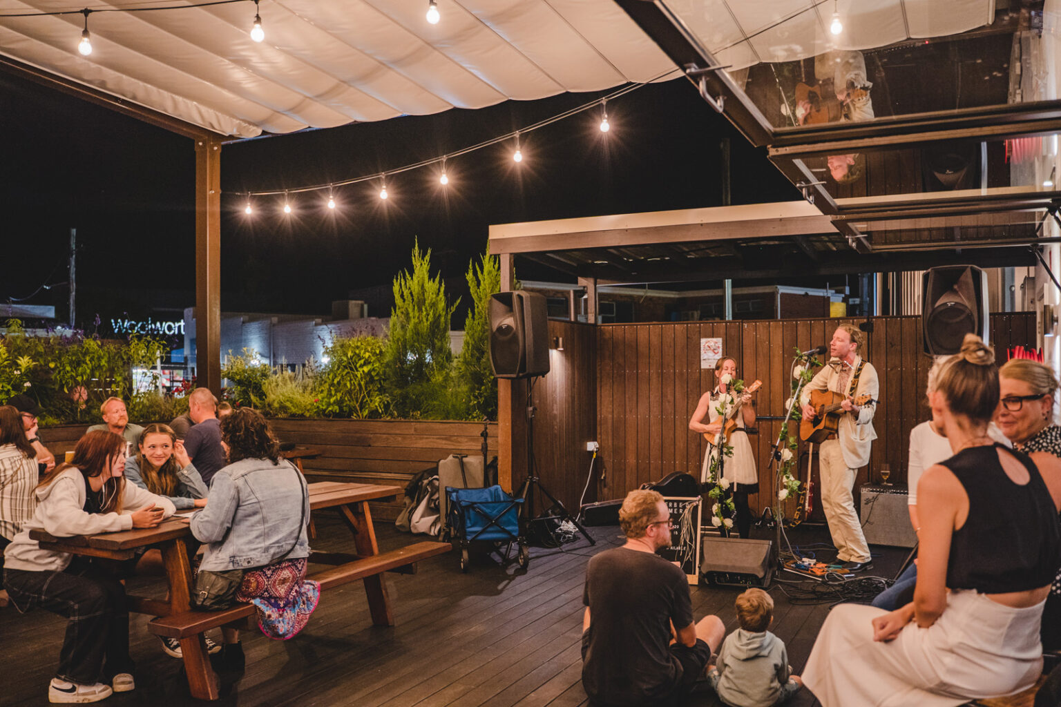 Listening to live music at Kingtide Brewing