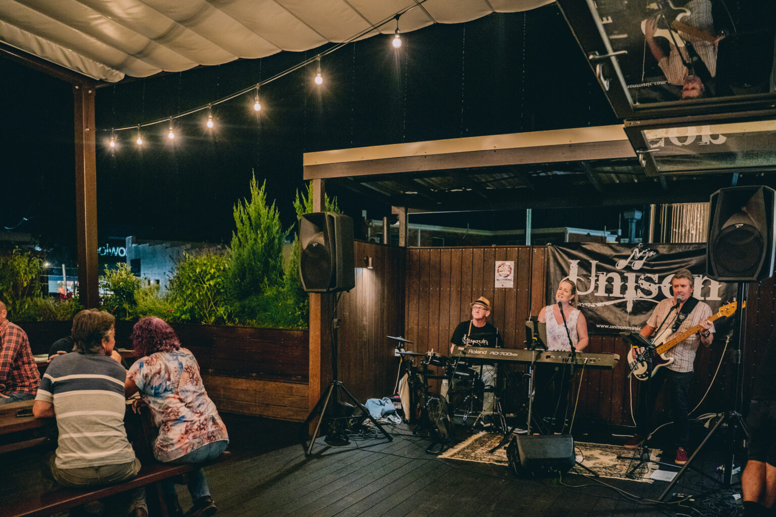 Listening to live music at Kingtide Brewing