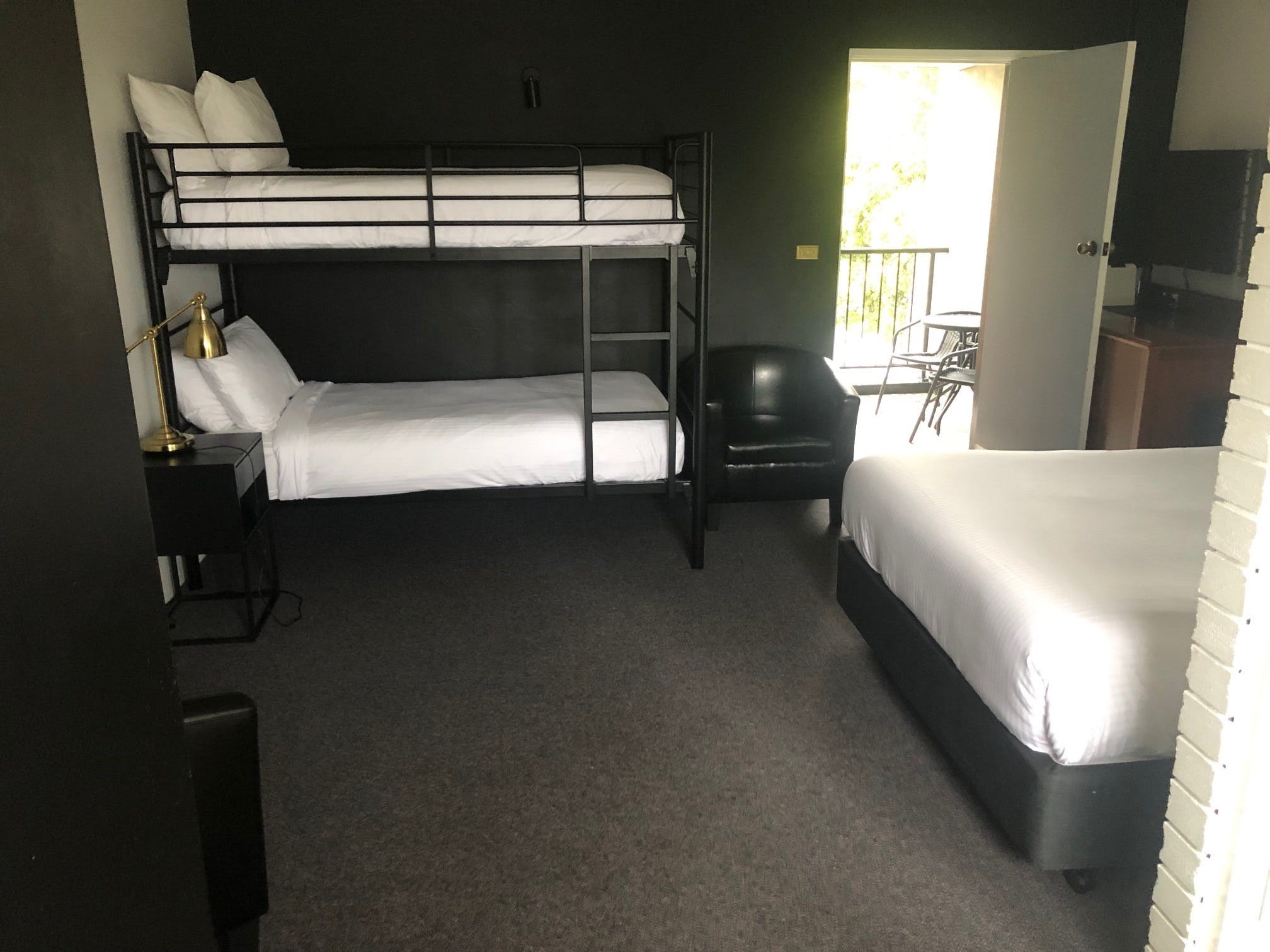 Comfortable Queen and Bunk beds to sleep four, with private balcony