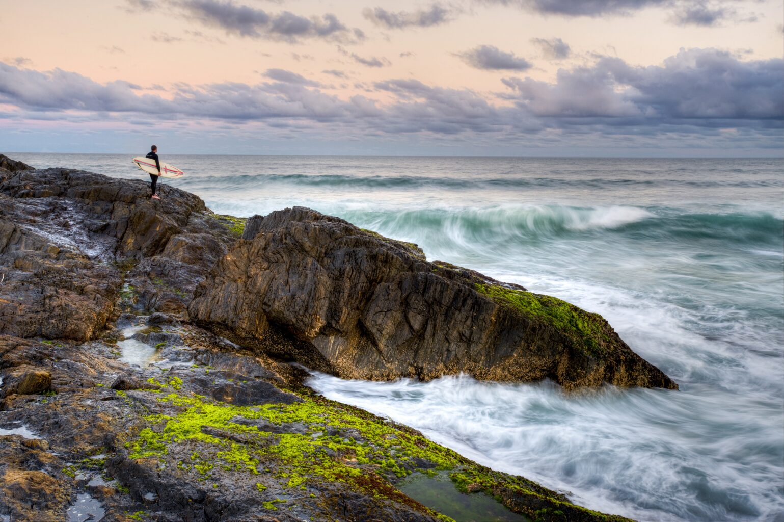 Surfer At Bonville Headland